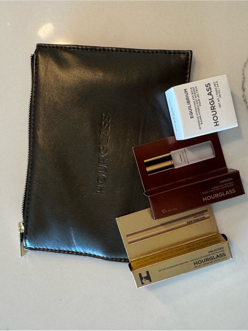 Hourglass Black Leather Zip Pouch with Branded Sample Boxes